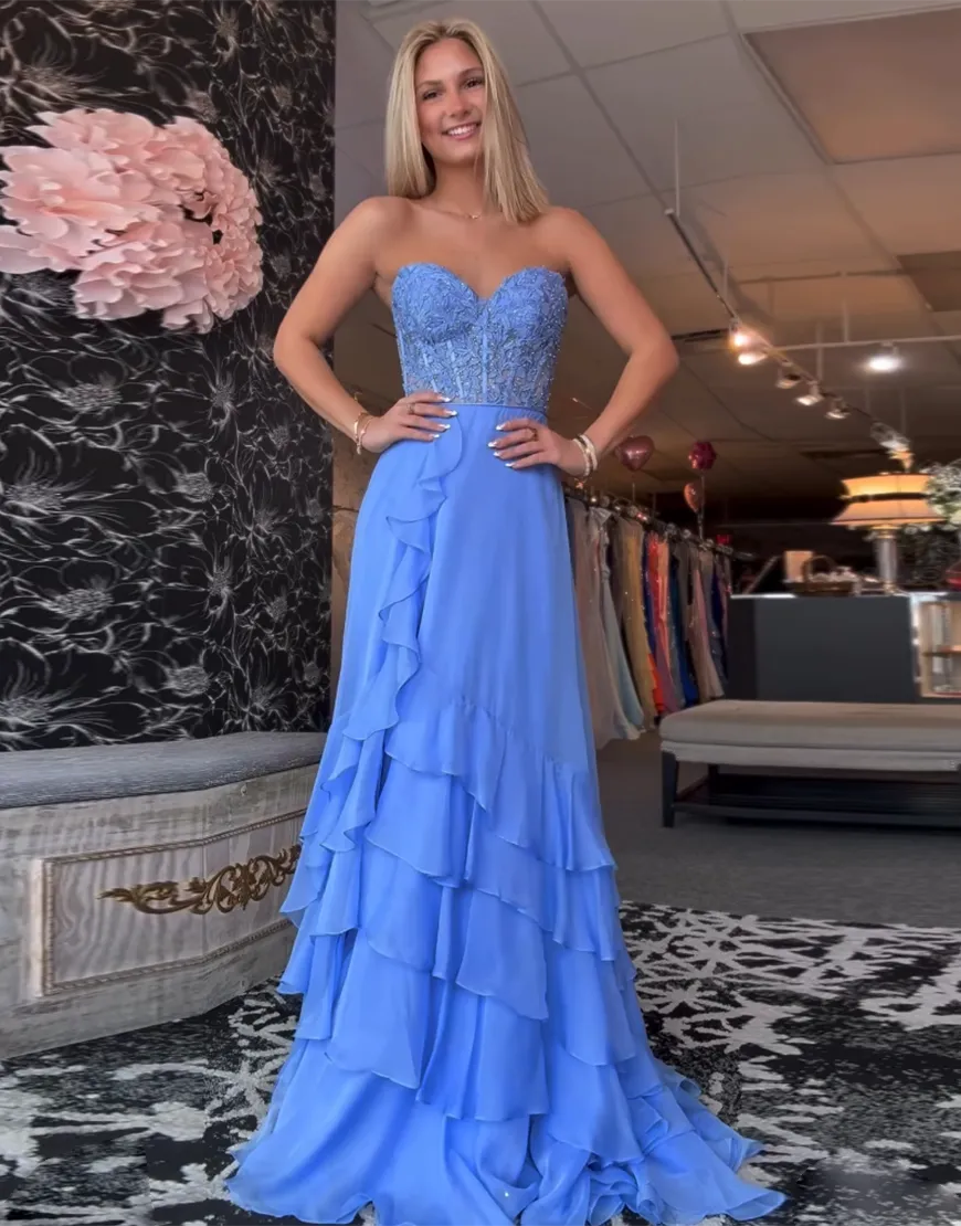 Blue long A-line waist cinched pleated strapless applique ball gown