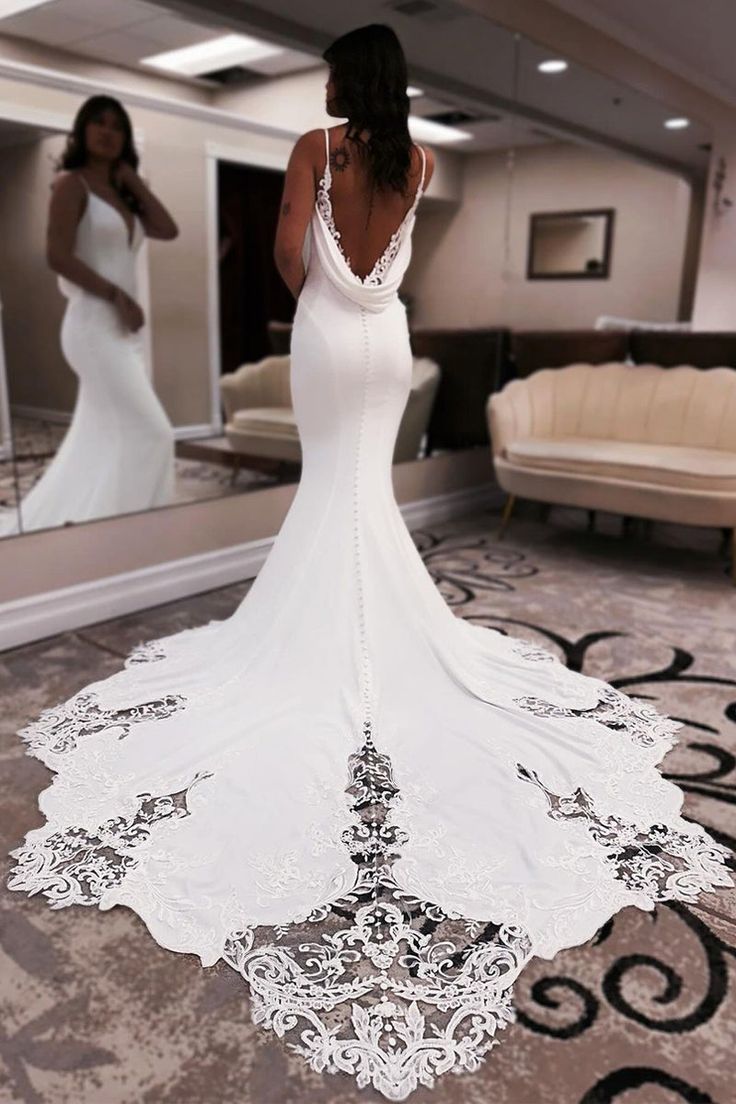 Unique mermaid V-neck satin wedding dress with decal