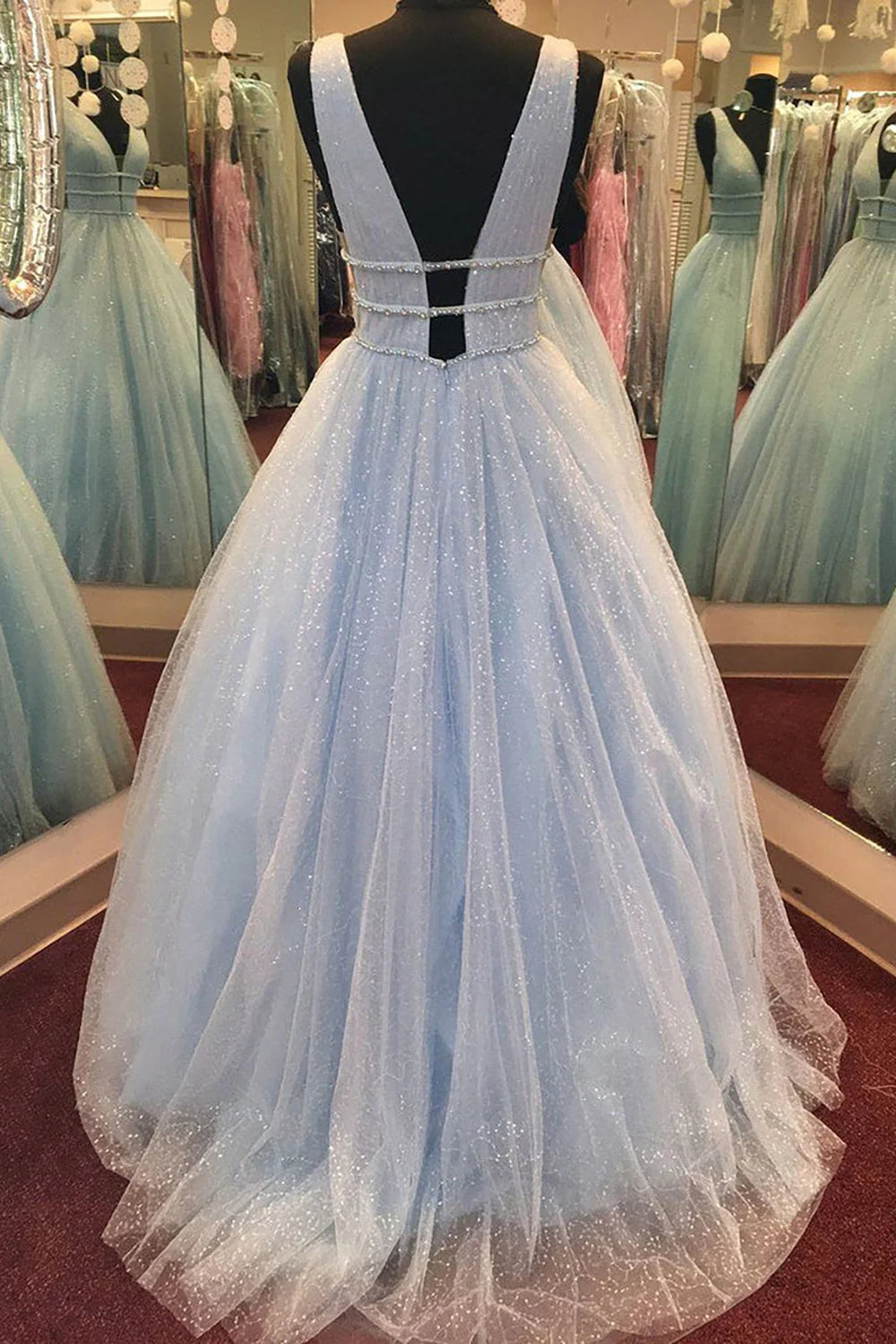 Light blue deep V-neck long sheer ball gown