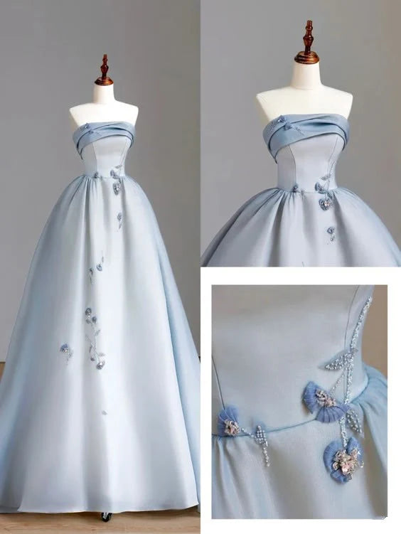 Light blue long floor length sleeveless evening gown