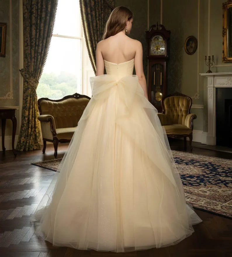 Charming Light Yellow A-Line Strapless Sleeveless Back Zip Ruched Bow Back Tulle Floor-Length Prom Dress