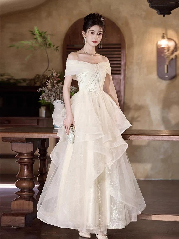 Elegant A-Line Off-the-Shoulder Embellished Ivory Maxi Prom Dress