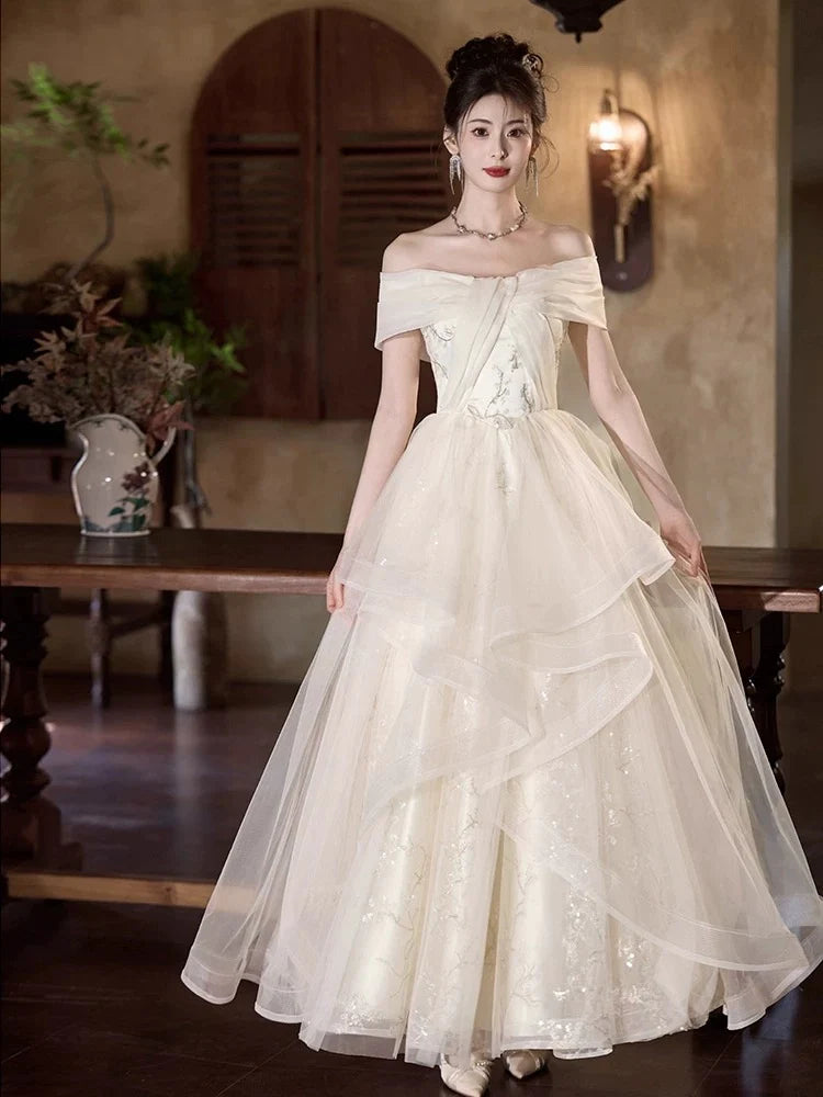 Elegant A-Line Off-the-Shoulder Embellished Ivory Maxi Prom Dress