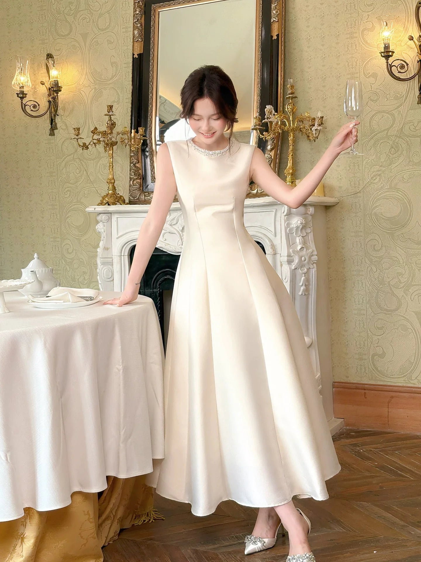 Elegant A-Line Round Neck Sleeveless Beaded Ivory Midi Prom Dress