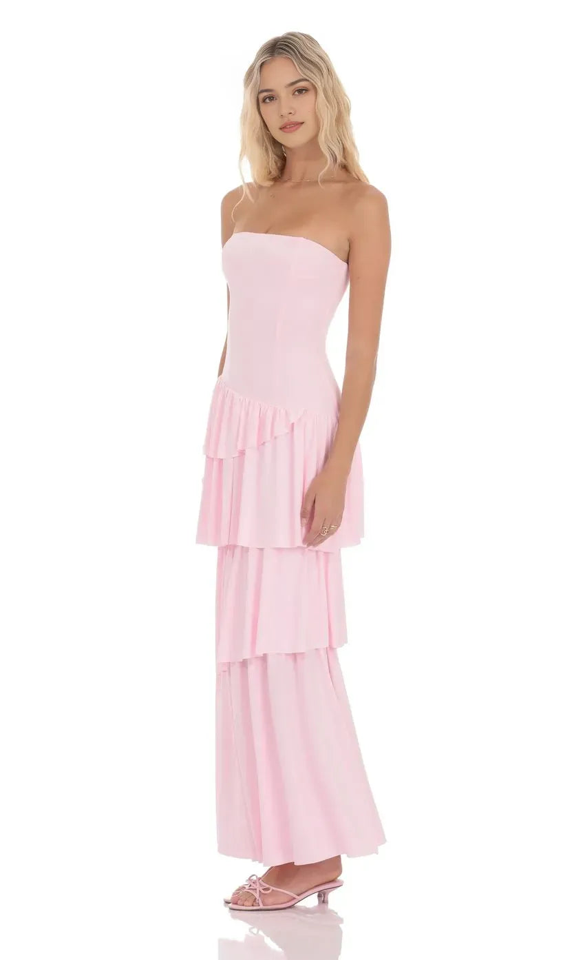 Elegant Blush Pink Strapless Prom Dress with Asymmetric Tiered Ruffle Skirt  Corset Bodice  Perfect for Romantic Prom Nights