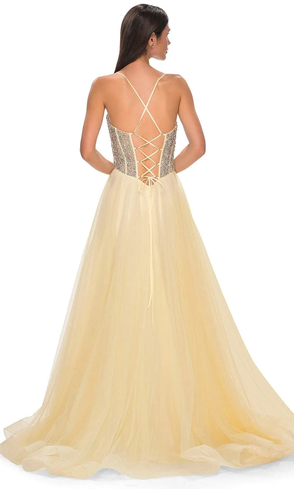 Elegant Blush Tulle Prom Gown with Intricate Beaded and Embroidered Corset Bodice for Formal Occasions