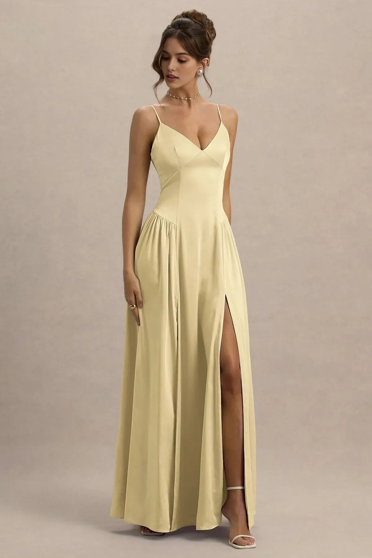 Elegant Champagne - Colored Prom Dress with Spaghetti Straps Deep V - Neckline Pleated Skirt, and Side Slit for Formal Occasions