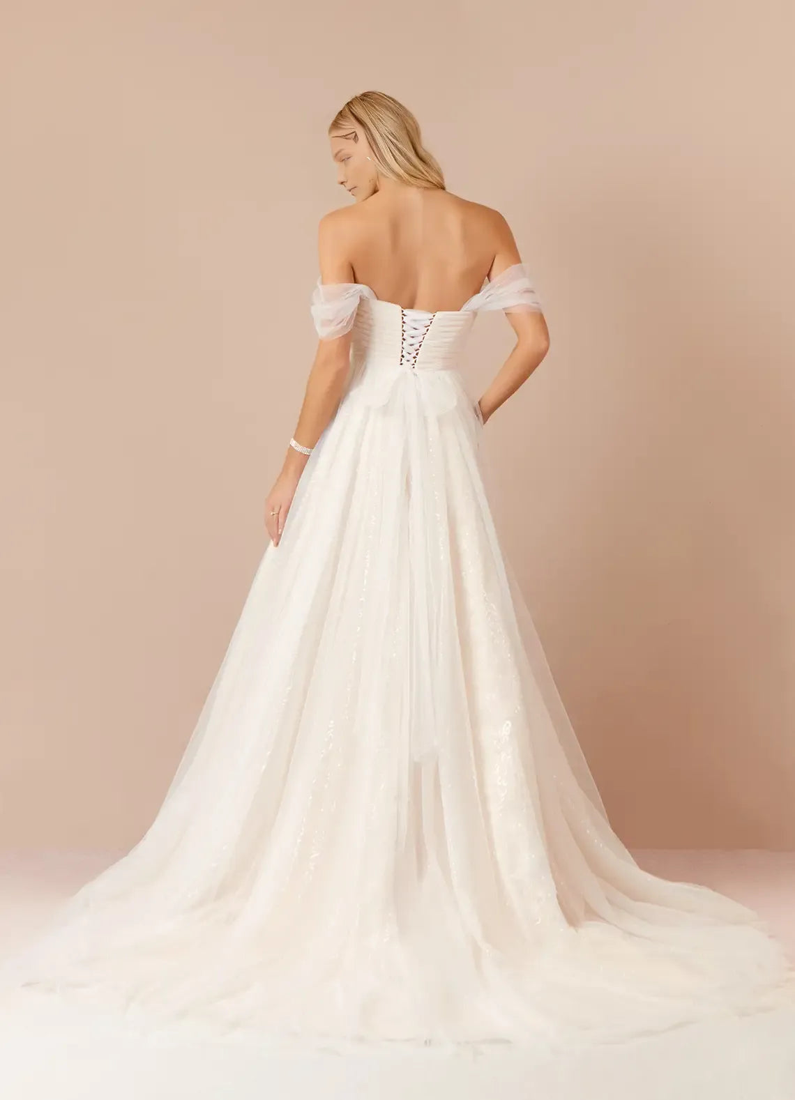 Elegant Champagne A-Line Off the Shoulder Tulle Sweetheart Neckline Wedding Dress with Sheer  Skirt Side Slit, and Sequin Detailing for a Romantic Bridal Look