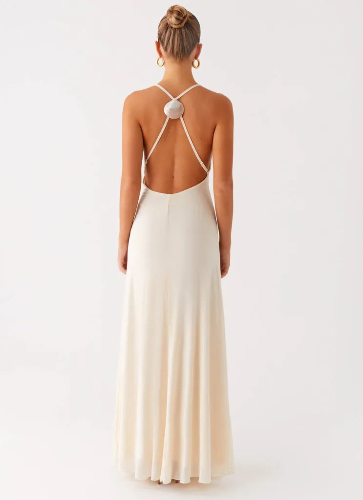 Elegant Ivory Satin Prom Dress with Cowl Neckline Halter Straps Open Back and Floor-Length Silhouette for Formal Occasions