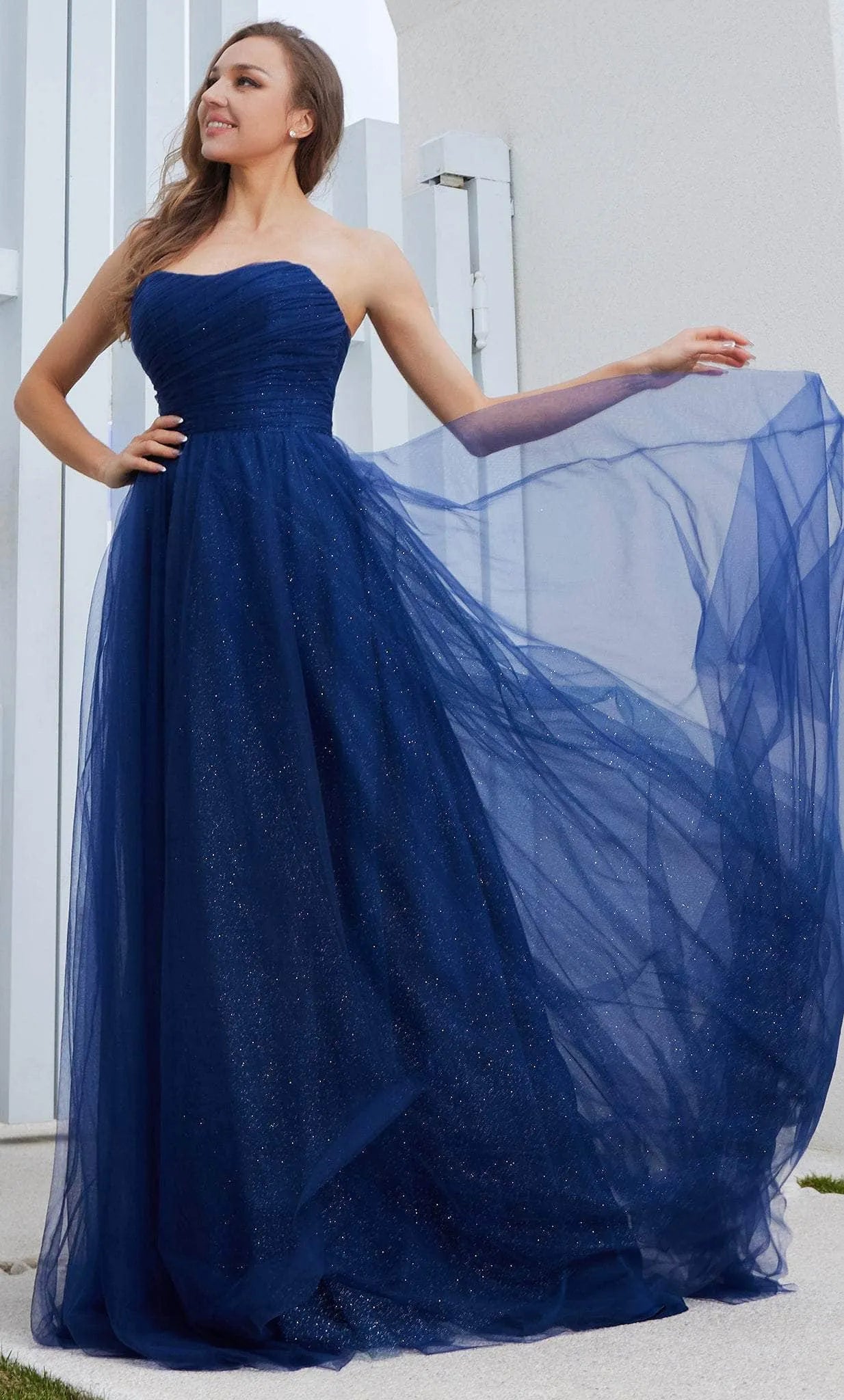 Elegant Light Blue Strapless Tulle Evening Gown with Ruched Bodice Flowy A Line Skirt Perfect for Proms Formal Galas and Dreamy Occasions