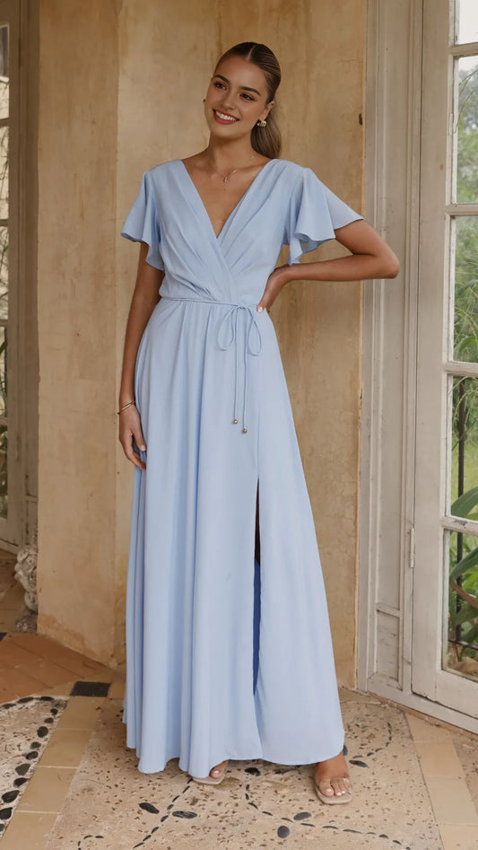 Elegant Light Blue Wrap Style Prom Dress with Flutter Sleeves and Side Slit Floor Length Formal Gown for Special Occasions