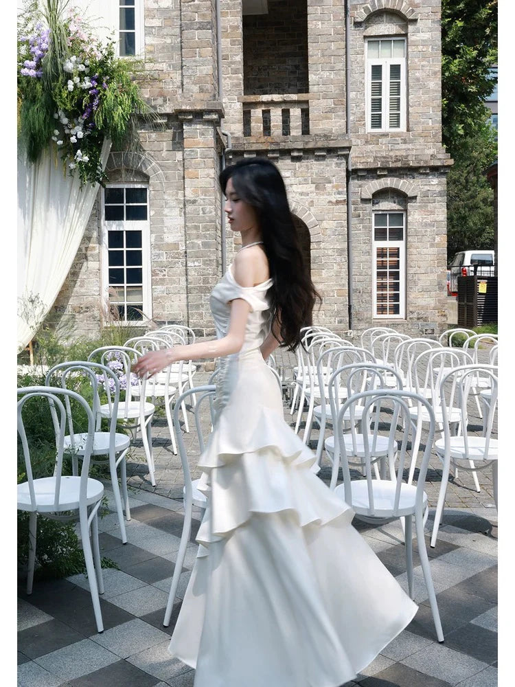 Elegant Mermaid Off-the-Shoulder Ruffled Ivory Maxi Prom Dress