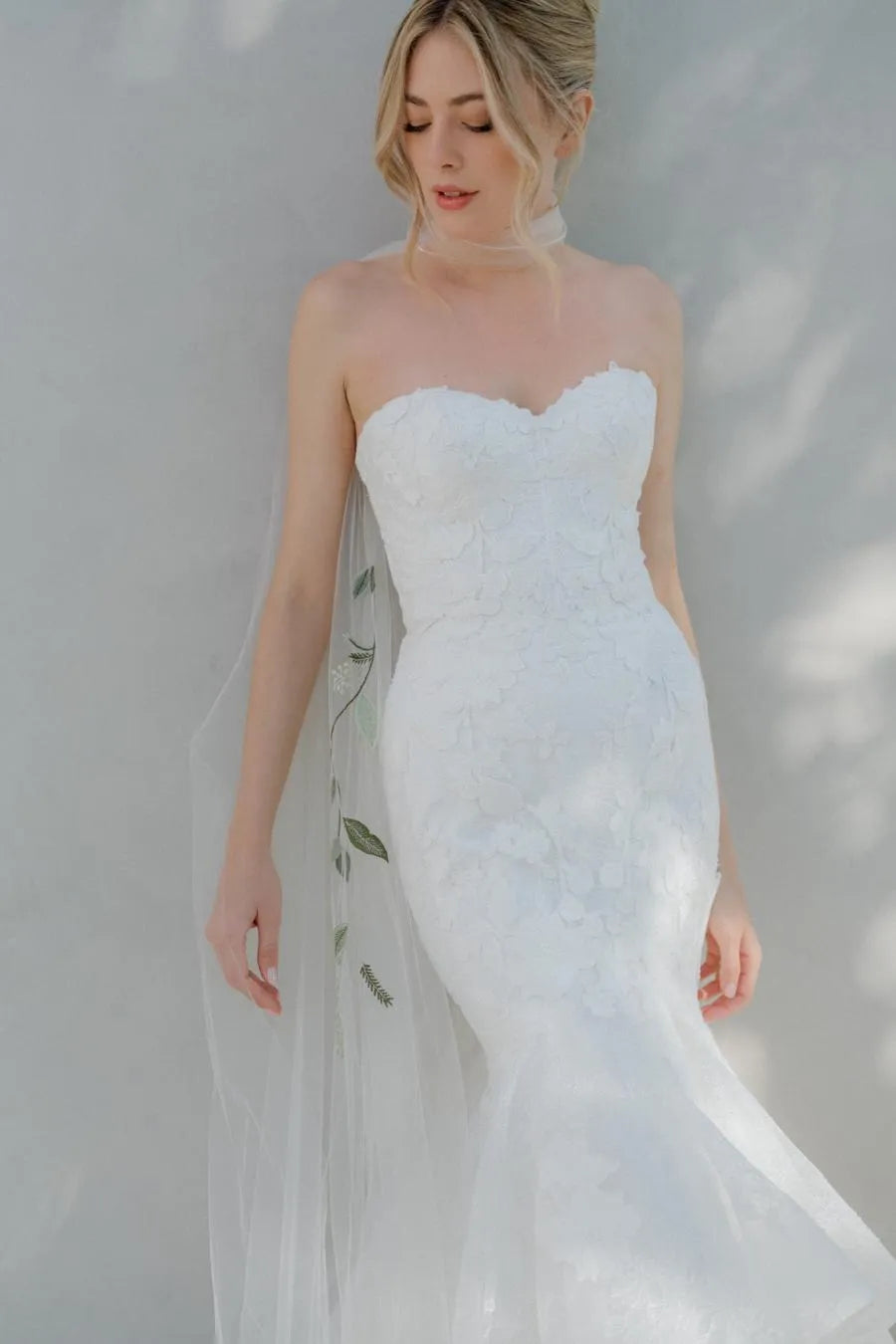 Elegant Mermaid Wedding Dress with Strapless Sweetheart Neckline Floral Lace Tiered Chiffon Train and Fitted Silhouette