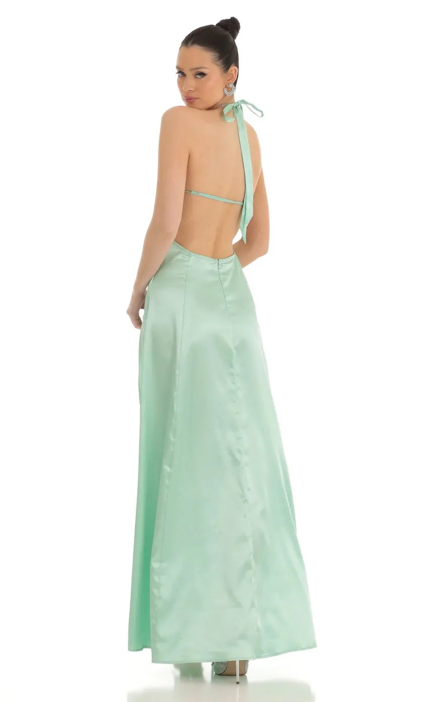 Elegant Mint Green Satin Prom Gown featuring Halter Neckline Side Slits and Back Bow Accent to Elevate Your Prom Night