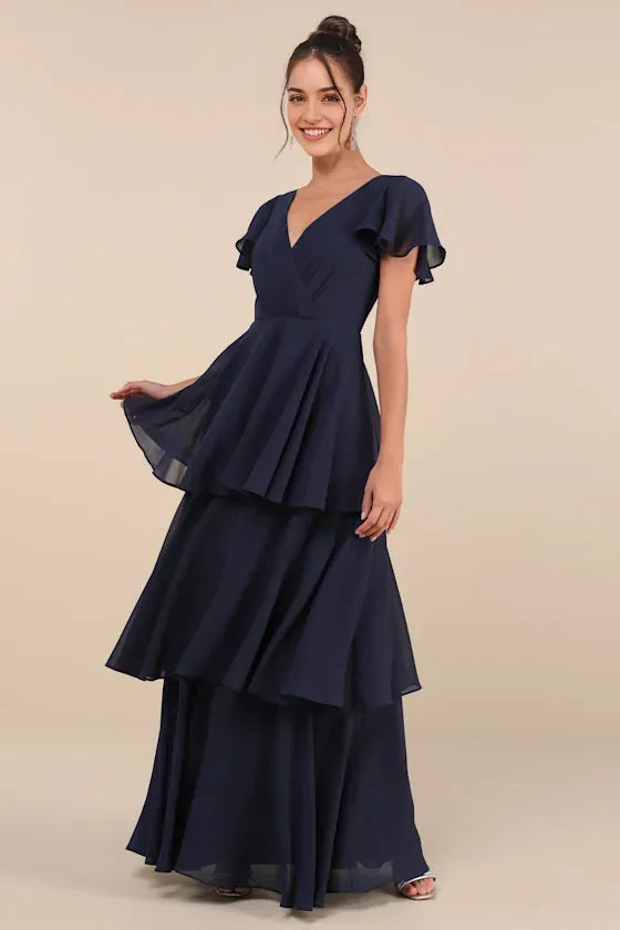 Elegant Navy Blue Chiffon Prom Dress with Flutter Sleeves Surplice V Neckline Tiered Ruffle Skirt and Flowy Floor Length Design for Formal Occasions