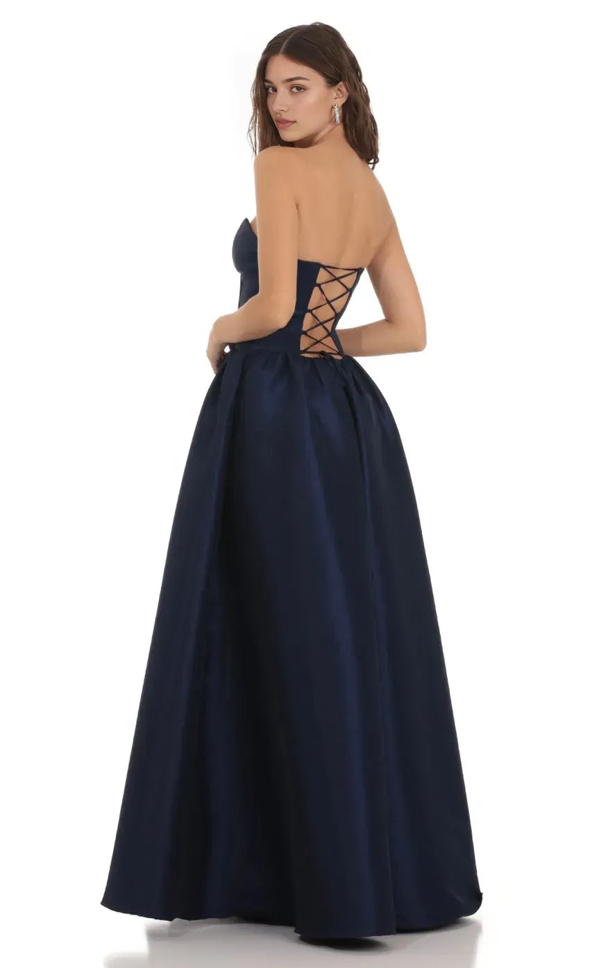 Elegant Navy Blue Strapless Prom Dress with Corset Bodice and Ball Gown Skirt Perfect for Formal Prom Nights
