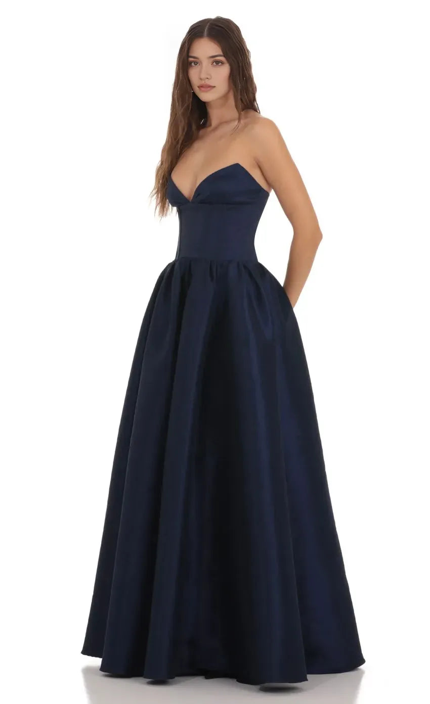 Elegant Navy Blue Strapless Prom Dress with Corset Bodice and Ball Gown Skirt Perfect for Formal Prom Nights