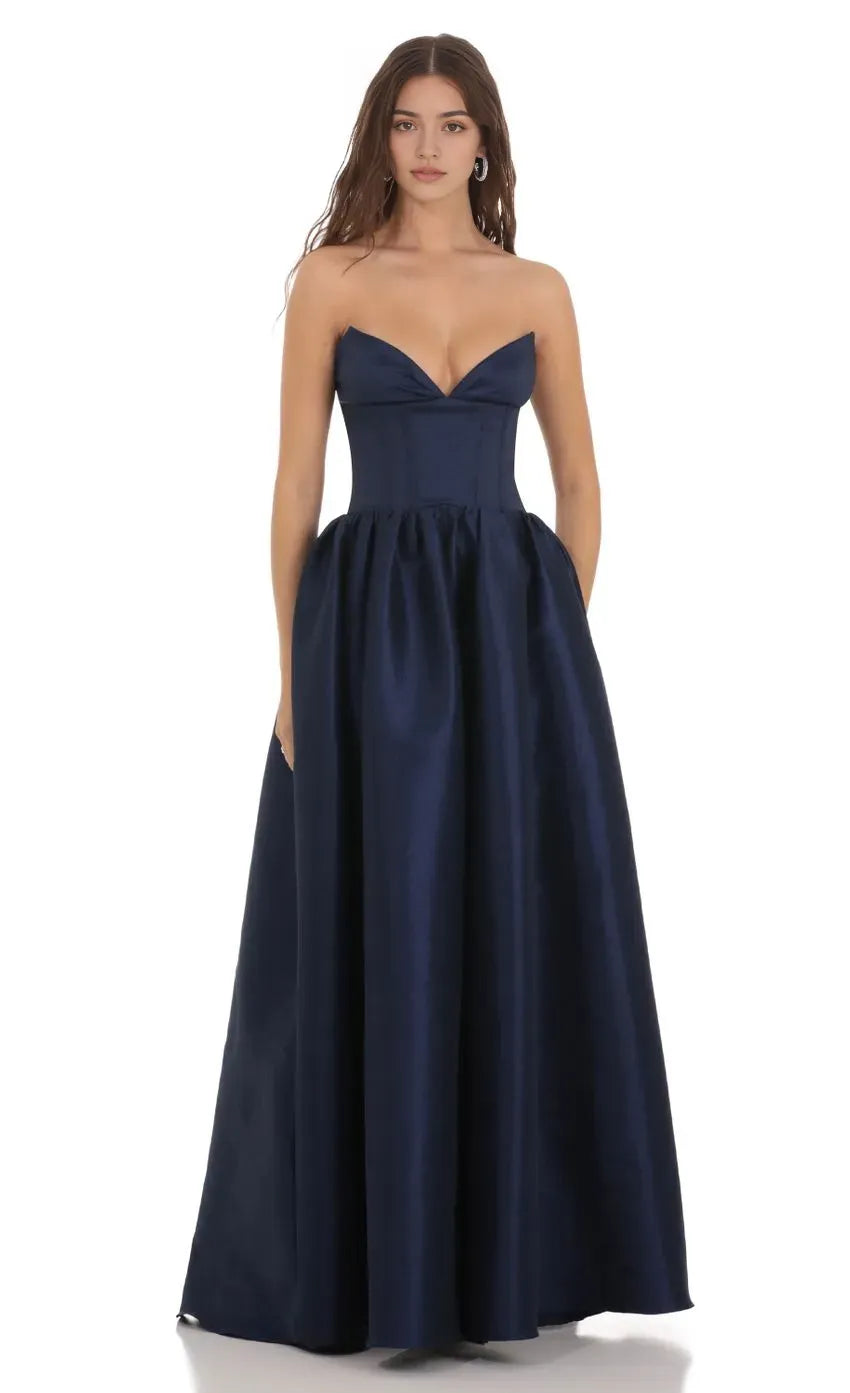 Elegant Navy Blue Strapless Prom Dress with Corset Bodice and Ball Gown Skirt Perfect for Formal Prom Nights