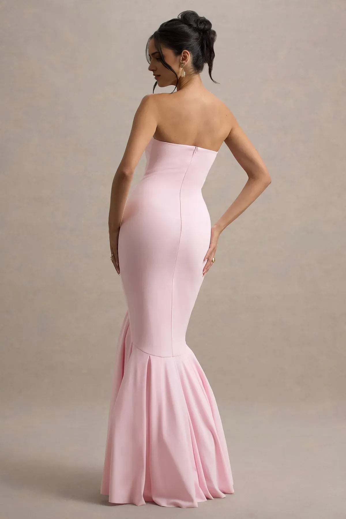 Elegant Strapless Blush Pink Mermaid Gown with Flared Hem Bodycon Silhouette Ideal for Proms Galas and Formal Evening Events