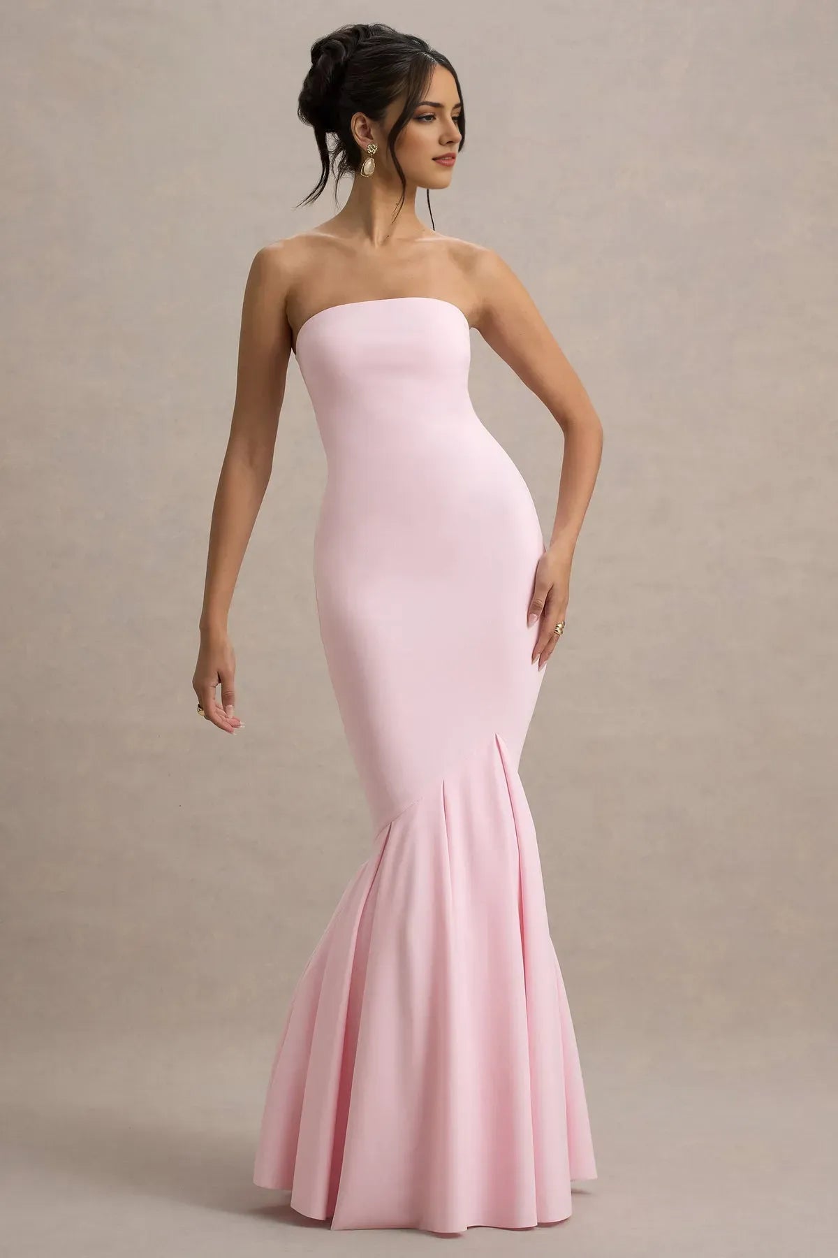 Elegant Strapless Blush Pink Mermaid Gown with Flared Hem Bodycon Silhouette Ideal for Proms Galas and Formal Evening Events