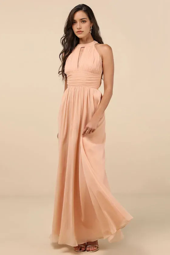 Elegant Peach - Colored Chiffon Prom Dress with Halter Neckline Keyhole Cutout Ruched Bodice and Flowy Floor  Length Skirt for Formal Occasions