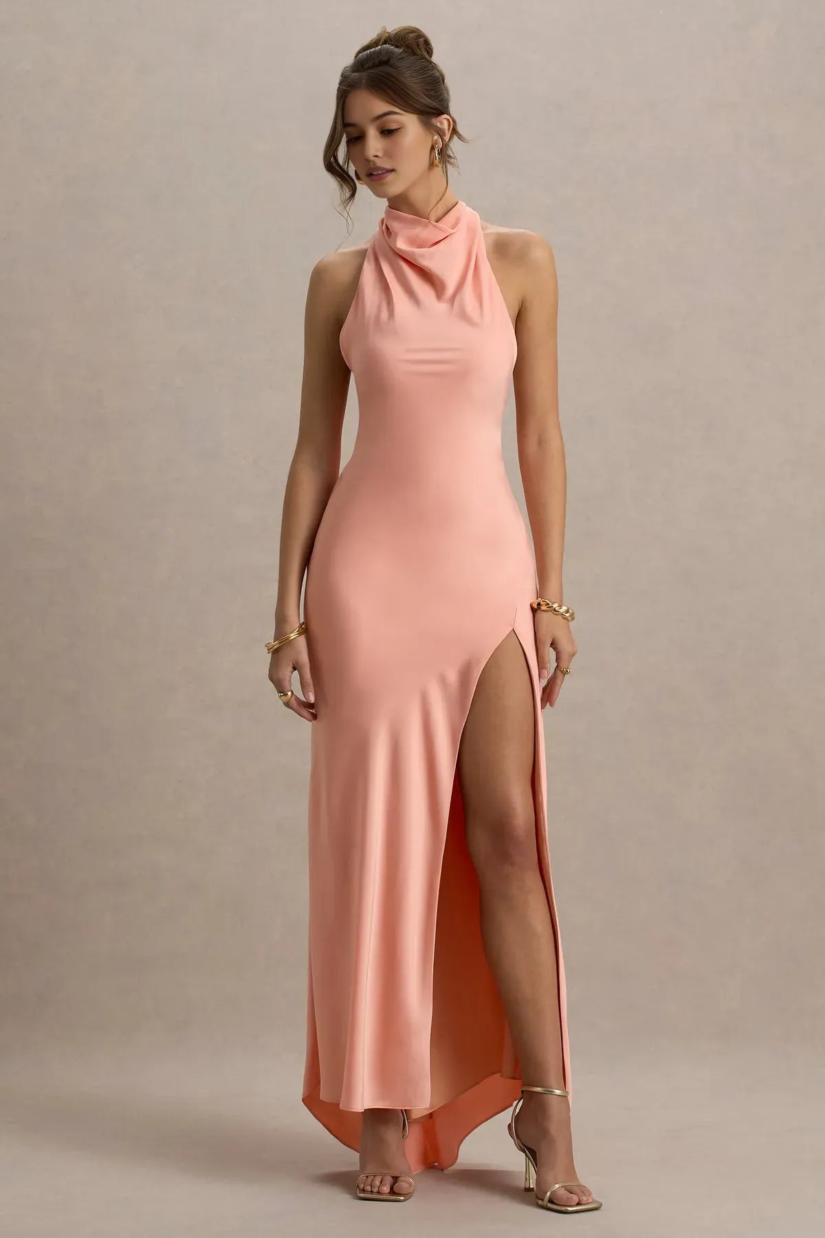 Elegant Peach - Colored Halter Neck Prom Dress with High Slit and Figure - Hugging Silhouette for Formal Occasions