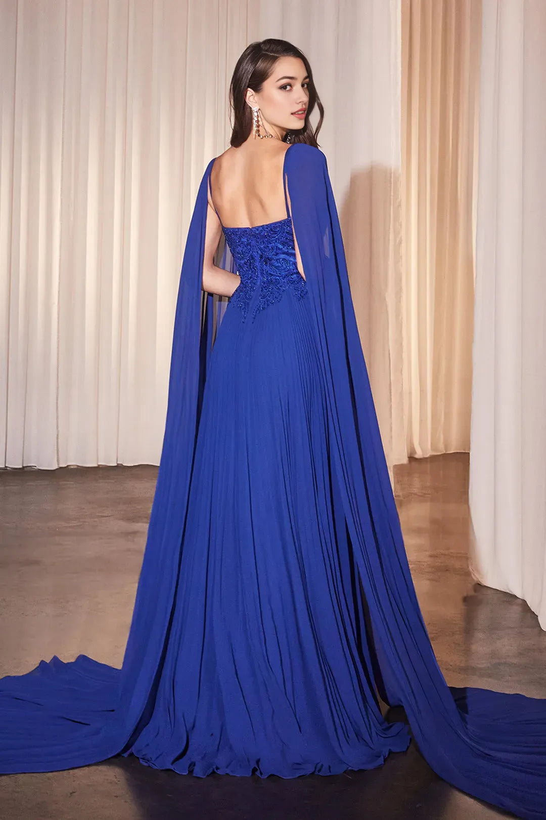 Elegant Sapphire Blue Evening Gown with Beaded Lace Top Sheer Cape Overlay and Flowy Pleats for Prom Nights