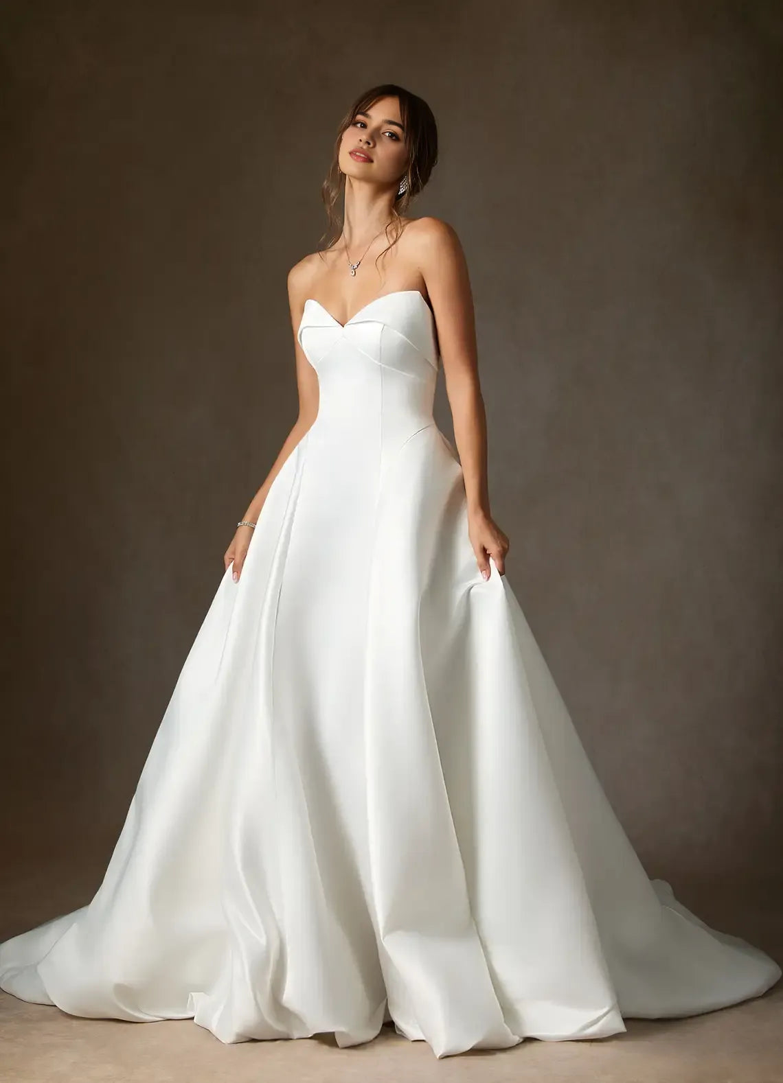 Elegant Satin A-Line Wedding Dress Strapless Sweetheart Neck Structured Silhouette Subtle Volume Floor Length Train Ideal for Formal Bridal Looks