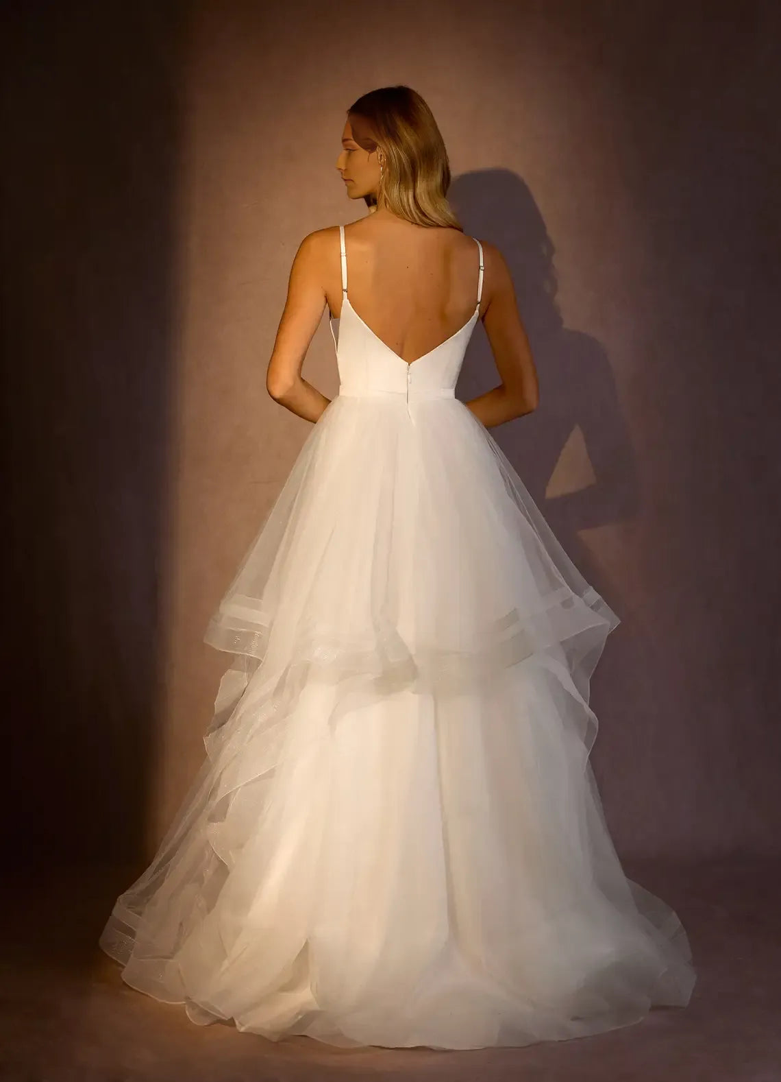 Elegant Spaghetti Strap V - Neck Wedding Dress with Layered Tulle Skirt and Satin Bodice for a Dreamy Bridal Look