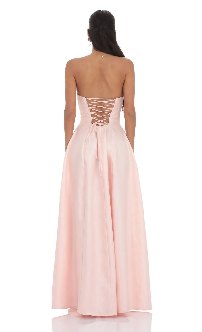 Elegant Strapless Blush Pink Prom Dress with Structured Bodice and Flared Ball Gown Skirt  Perfect for Timeless Prom Style