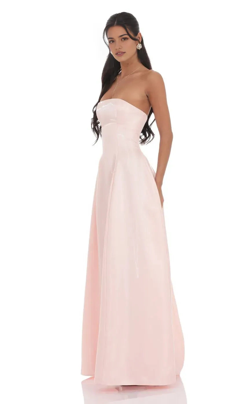 Elegant Strapless Blush Pink Prom Dress with Structured Bodice and Flared Ball Gown Skirt  Perfect for Timeless Prom Style