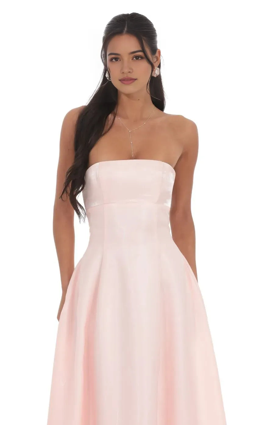Elegant Strapless Blush Pink Prom Dress with Structured Bodice and Flared Ball Gown Skirt  Perfect for Timeless Prom Style