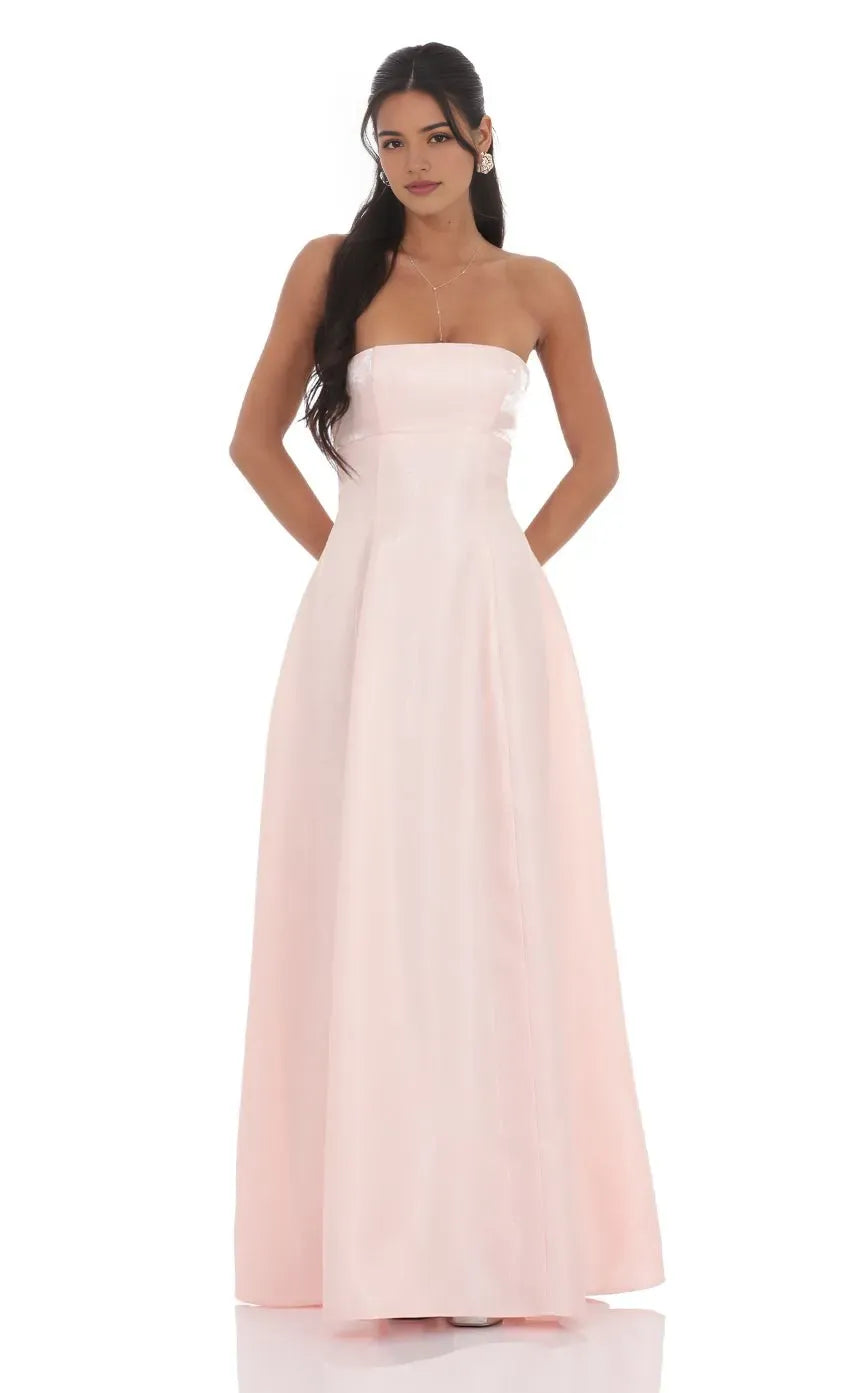 Elegant Strapless Blush Pink Prom Dress with Structured Bodice and Flared Ball Gown Skirt  Perfect for Timeless Prom Style