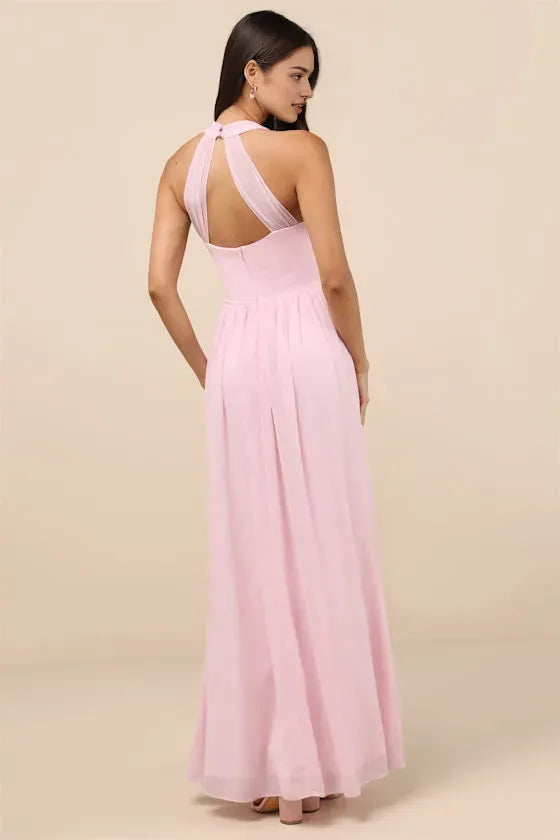 Glamorous Blush Pink Prom Dresses featuring Halter Neckline Twist Front Detail Flowy Chiffon Skirt and High  Slit Design  Perfect for Prom Nights