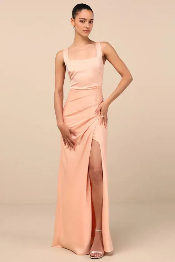 Glamorous Peach Satin Prom Dresses featuring Square Neckline Draped Bodice Design and Dramatic High Slit Skirt Perfect for Prom Nights