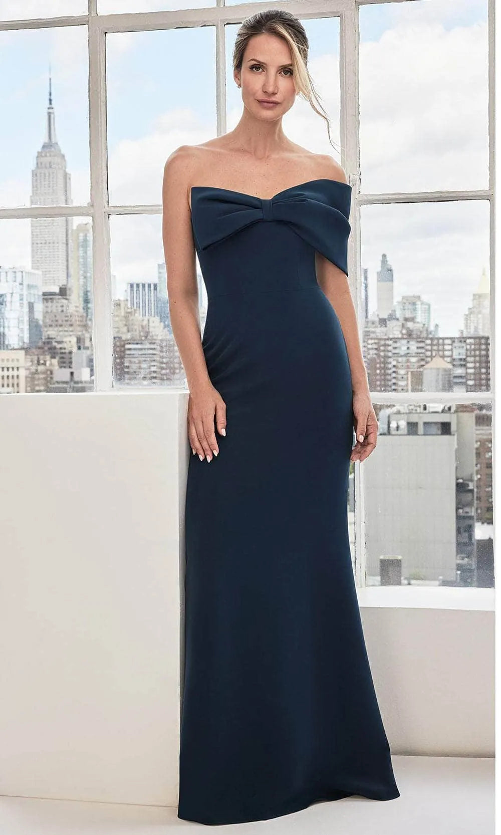 Elegant Navy Blue Strapless Evening Gown with Bow Front Detail Form Fitting Mermaid Silhouette and Structured Bodice for Formal Galas Black Tie Weddings and City Chic Events