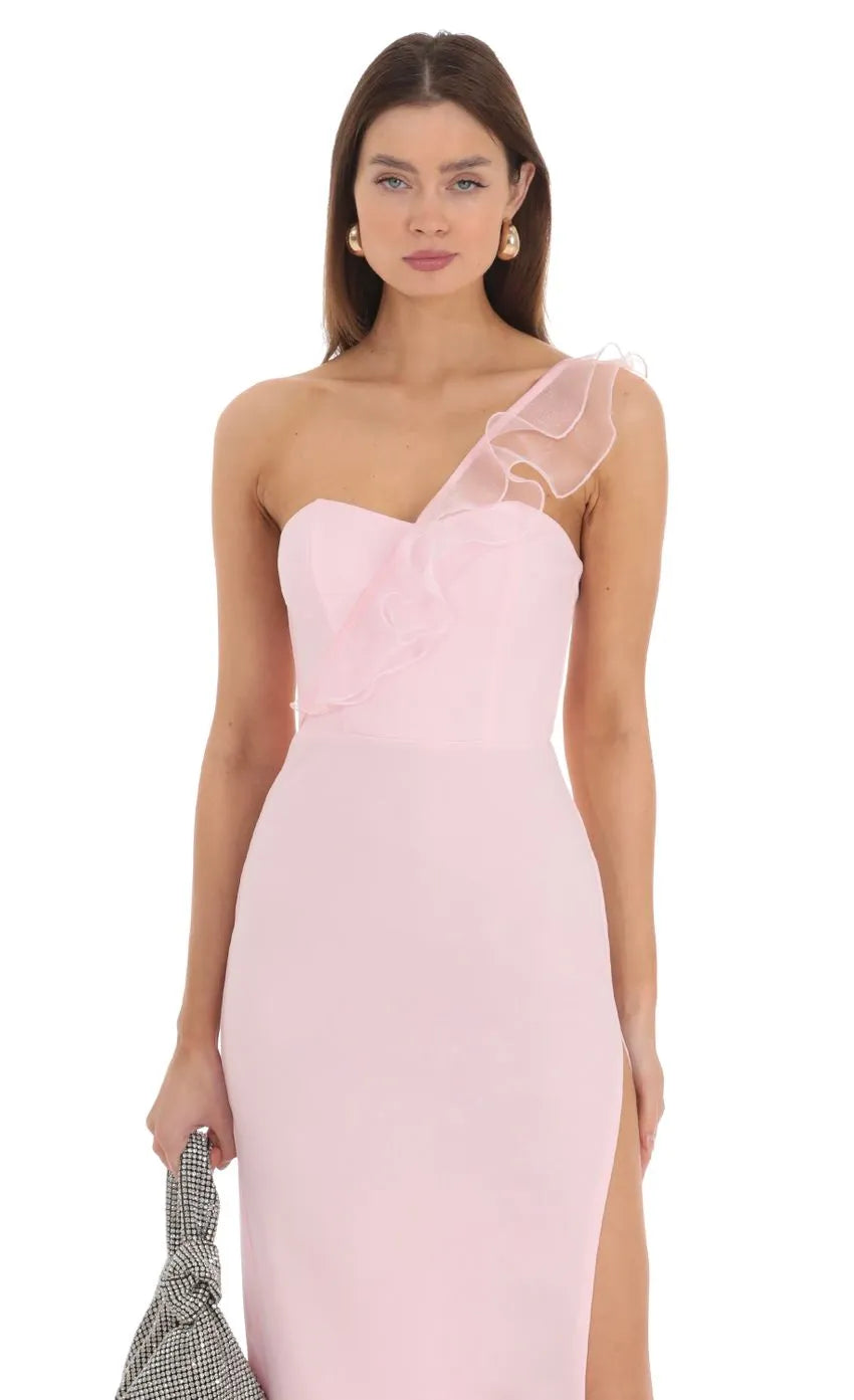 Light Pink One Shoulder Prom Dress with Sheer Ruffle Accent Form Fitting Silhouette and High Thigh Slit for Elegant Formal Occasions