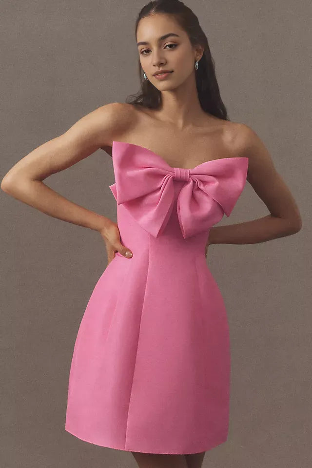 Pink Strapless Homecoming Gown Featuring Bold Bow Embellishment and Flattering Fit Crafted for Fashion  Forward Teens
