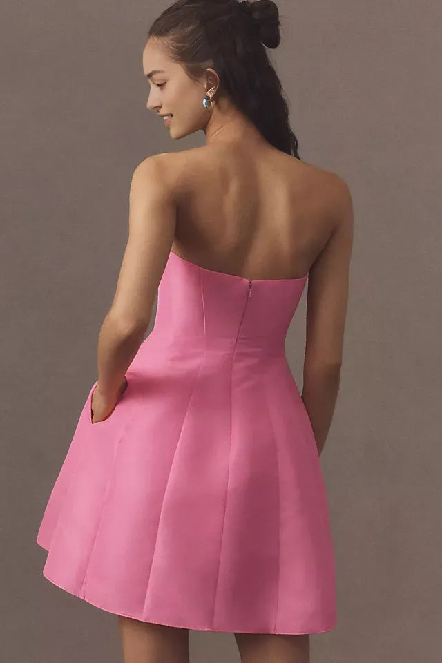 Pink Strapless Homecoming Gown Featuring Bold Bow Embellishment and Flattering Fit Crafted for Fashion  Forward Teens