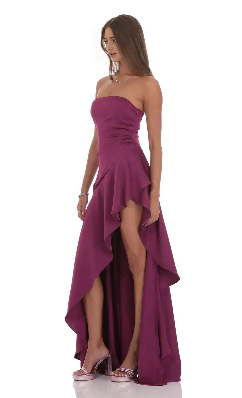 Plum Satin Strapless Prom Dress with Asymmetric Ruffle Hem Side Ruche Detail and High Low Silhouette Perfect for Formal Galas