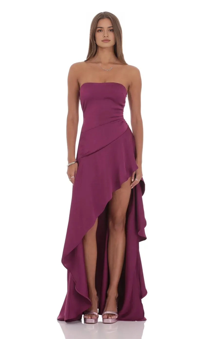 Plum Satin Strapless Prom Dress with Asymmetric Ruffle Hem Side Ruche Detail and High Low Silhouette Perfect for Formal Galas