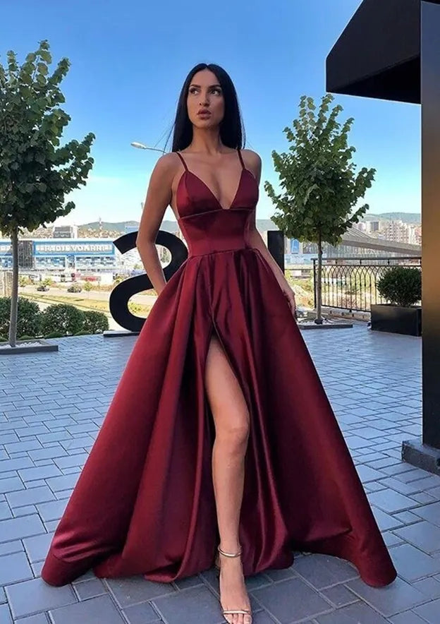 Romantic Burgundy Prom Dress with Deep V - Neck Spaghetti Straps and Flowy Skirt