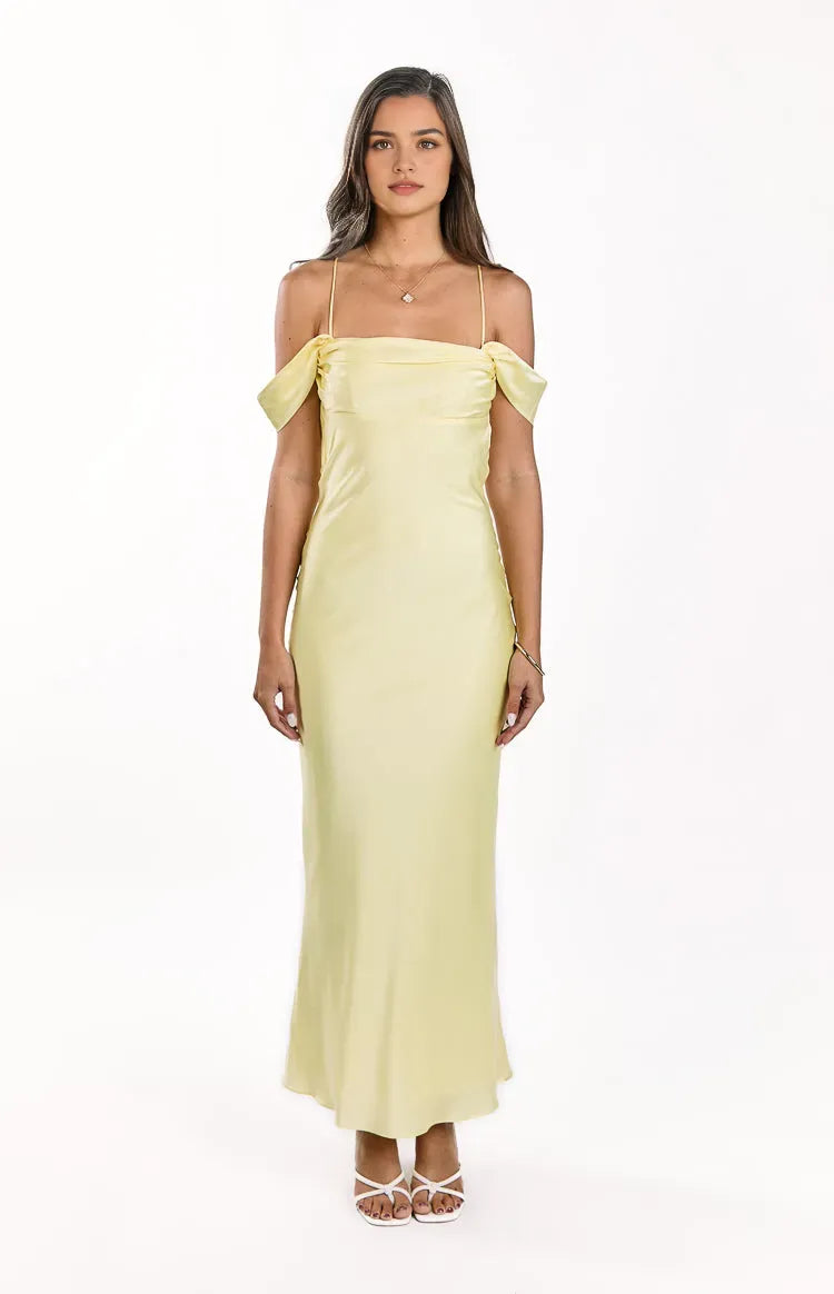 Romantic Pale Yellow Satin Prom Dress Off Shoulder Spaghetti Straps Cowl Neck Flowy Maxi Design for a Sweet Appeal