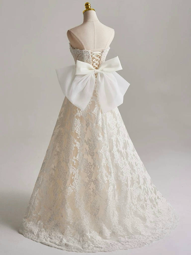 Romantic Strapless Lace Wedding Dress with Bow Back Detail Floral Embroidery Corset Bodice and Ball Gown Silhouette for Fairytale Brides