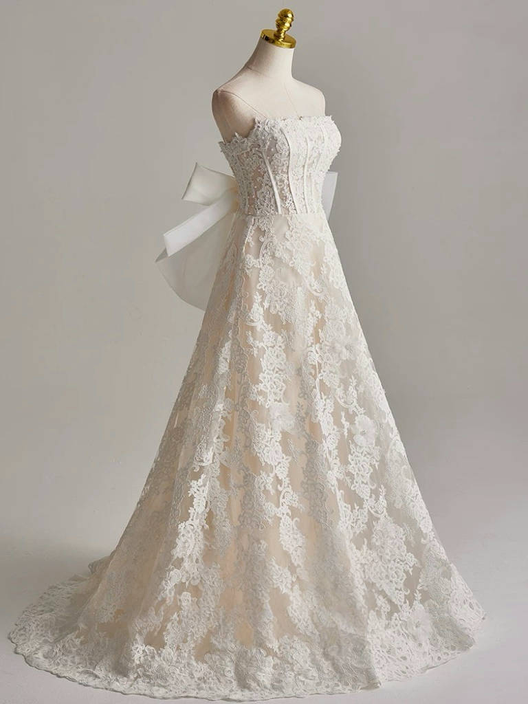 Romantic Strapless Lace Wedding Dress with Bow Back Detail Floral Embroidery Corset Bodice and Ball Gown Silhouette for Fairytale Brides