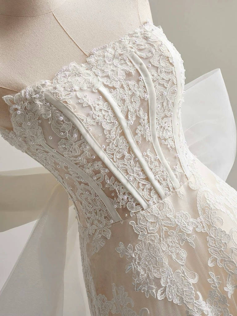 Romantic Strapless Lace Wedding Dress with Bow Back Detail Floral Embroidery Corset Bodice and Ball Gown Silhouette for Fairytale Brides
