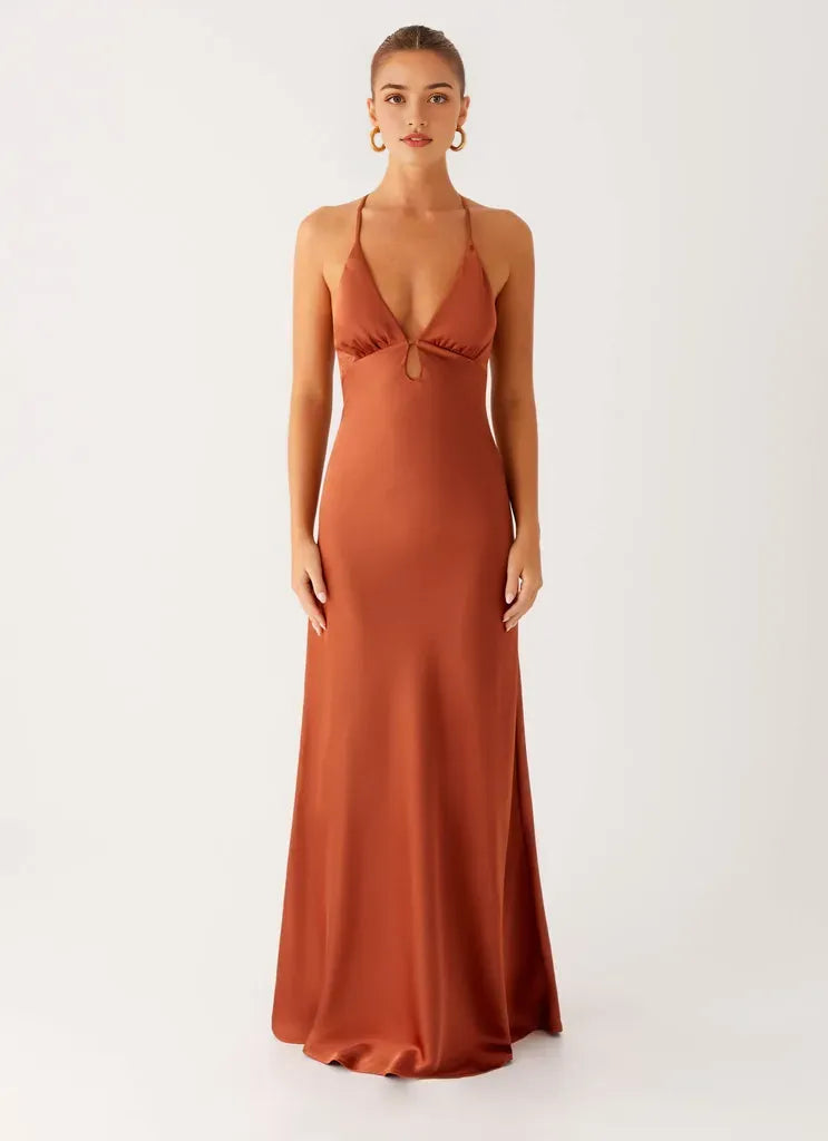 Rust Satin Prom Dress with Plunging V - Neck Halter Straps Keyhole Detail  Floor - Length Silhouette  Perfect for Formal Galas