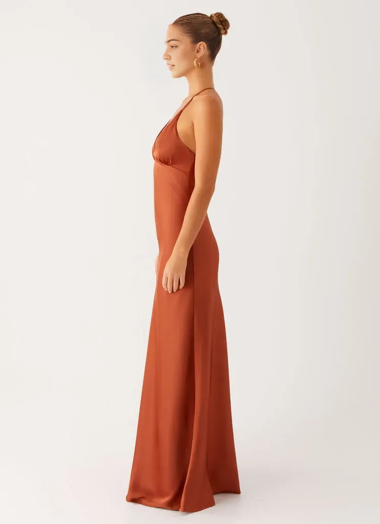 Rust Satin Prom Dress with Plunging V - Neck Halter Straps Keyhole Detail  Floor - Length Silhouette  Perfect for Formal Galas