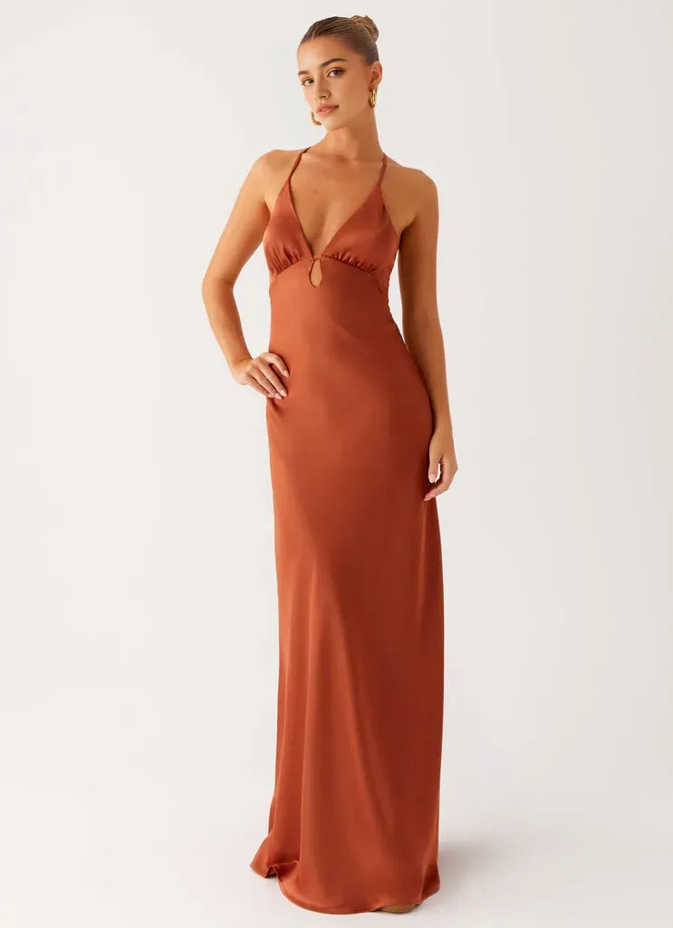 Rust Satin Prom Dress with Plunging V - Neck Halter Straps Keyhole Detail  Floor - Length Silhouette  Perfect for Formal Galas