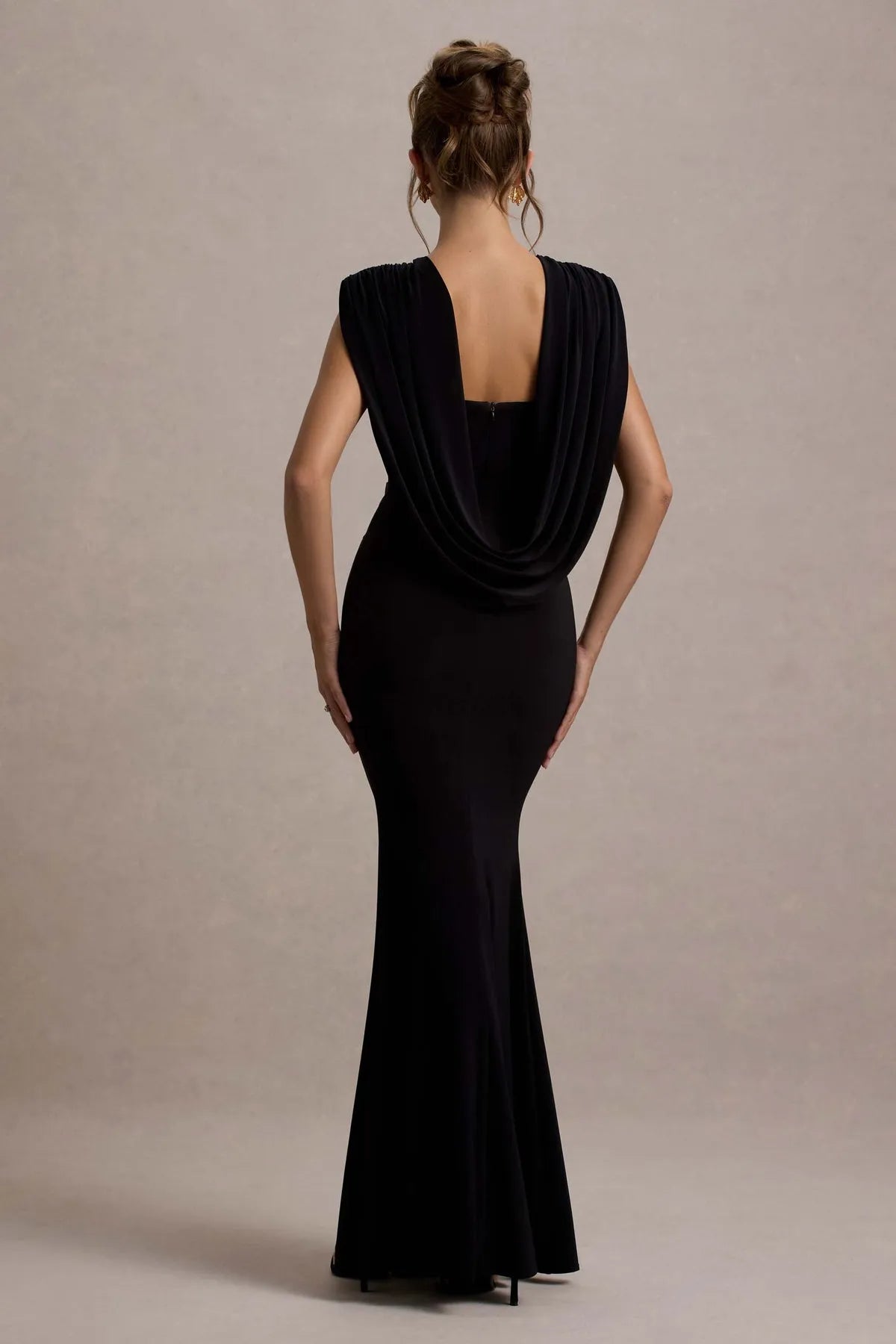 Sophisticated Black Mermaid -Style Prom Gown with Unique Shoulder Detail and Figure  Hugging Fit for Glamorous Evenings